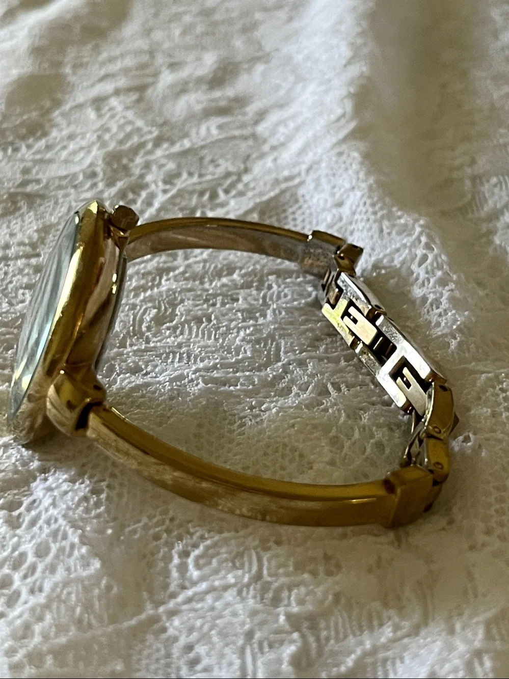 Anne Klein Gold Tone Bangle Watch with Black Dial and Gold Markers